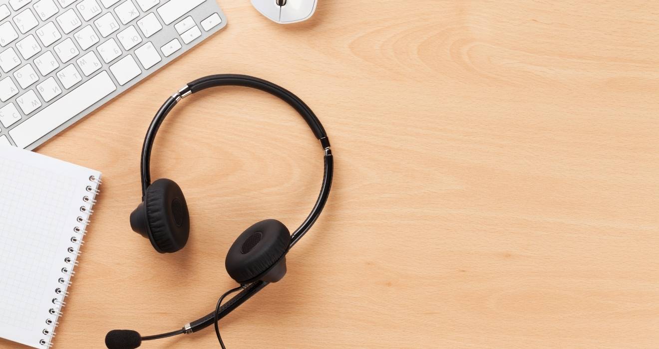 Headset and keyboard at Cloud Based Contact Center Solution