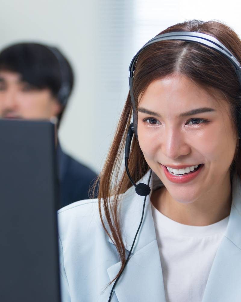 woman answering a call in a call center